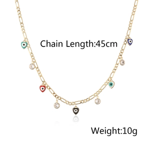 Detail view of gold heart evil eye necklace with 45cm chain length and 10g weight details
