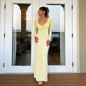 Slim fit light yellow maxi dress with V-neck ruffle details and long sleeves for autumn