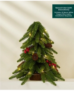 Detail of mini artificial Christmas tree with wood base, red berries and 20 LED warm lights