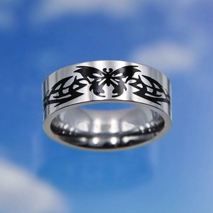 Detailed view of punk style silver butterfly ring with black textured hollow-out design