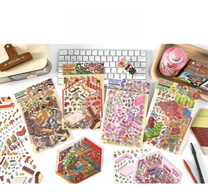 Flat lay of 2.5D cartoon scene stickers for DIY scrapbooking with diverse themes
