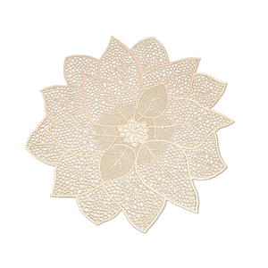 Golden PVC hollow leaf table mat with floral lace design for elegant dining decor