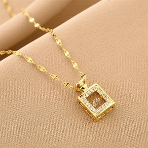 Elegant gold perfume bottle pendant necklace with sparkling zircon and water wave chain
