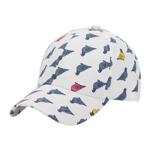 Detail of white baseball cap with colorful all-over pigeon print and artistic text