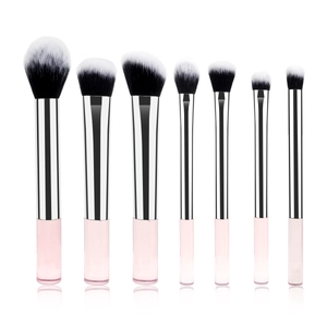 7-piece professional makeup brush set with pink transparent handles and silver ferrules