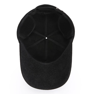 Men's winter black wool baseball cap with foldable earflaps and warm fabric texture