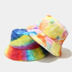 Plush tie-dye faux rabbit fur bucket hats in vibrant rainbow and macaron gradient tones