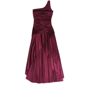 Detail of burgundy one-shoulder satin dress featuring elegant pleats and asymmetric hem