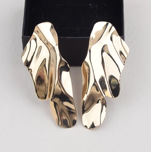 Irregular golden geometric metal stud earrings with folding texture and black gift box