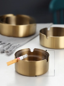 Deep gold stainless steel ashtray with a windproof tall cylinder and brushed metal finish