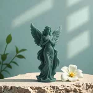 Detailed view of the turquoise angel silicone mold candle with fine wing textures