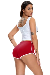 Detailed back view of red yoga shorts with white piping and matching sleeveless top