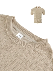 Detailed macro view of khaki polo shirt showing the unique textured jacquard weaving fabric