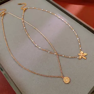 Titanium steel flower and sunburst coin pendant necklace with elegant white beads