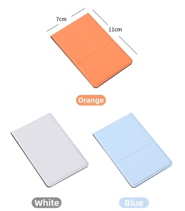 Detail showing 7x11cm slim leather pouches in orange, white, and blue with fine stitching