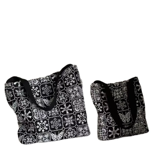 Elegant black canvas tote bag set with white butterfly embroidery in two sizes