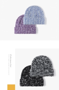 Close-up of four colors of fuzzy knit beanies showing plush faux mink fur texture