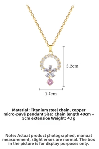 Detailed close-up of a floral pendant necklace with pink zircon and gold titanium chain