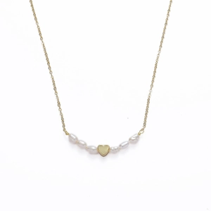 Elegant gold vacuum-plated freshwater pearl necklace with heart pendant on white background