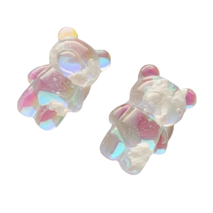 Pair of colorful iridescent bear-shaped phone grips with dreamy cloud-like interior texture