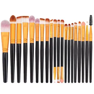 Flat lay of 20-piece makeup brush set with black handles and multi-colored bristles