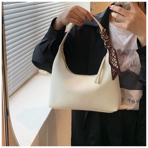 Minimalist beige underarm bag for women featuring a stylish geometric silk scarf detail
