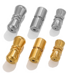 Detailed view of gold and silver magnetic jewelry clasps in various textures and shapes