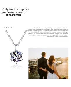 Detail of moissanite necklace with classic six-prong setting and round cut pendant