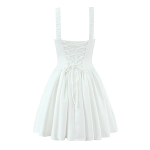 Detailed back view of white lace-up dress featuring ruffled straps and drawstring ties