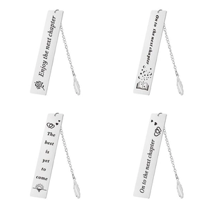 Detail of four silver stainless steel bookmarks with feather pendants and engraved quotes