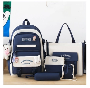 Navy blue and cream five-piece student backpack set with tote bag and pouches
