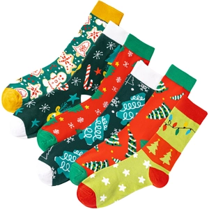 Christmas themed knit crew socks with patterns like gingerbread men and festive trees