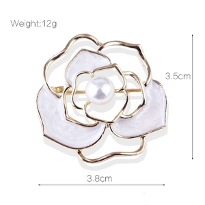 Golden camellia flower brooch with white enamel and pearl center, size 3.5cm x 3.8cm