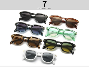 Showcase of seven color options for retro round sunglasses with gold arrow rivets