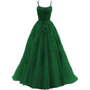 Detail of dark green evening gown featuring fine lace appliques and spaghetti straps