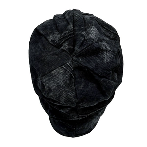 Detailed top view of vintage washed black cotton slouchy beanie with pleated texture