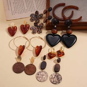 Collection of acrylic resin heart and flower earrings in tortoiseshell brown and gold