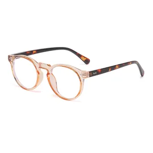 Retro round champagne orange frame sunglasses with dark tortoiseshell textured temples