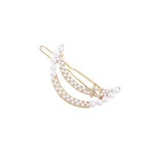 Elegant gold moon hair clip with white pearls and star detail on white background