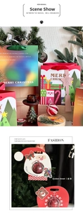 Christmas gift set showing Santa Claus paper boxes and colorful festive carrier bags