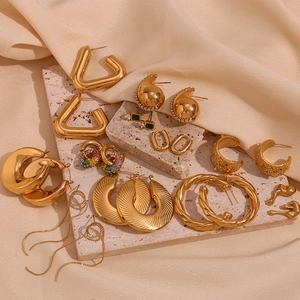 Detailed collection of 18K gold plated earrings with geometric textures and micro-inlays