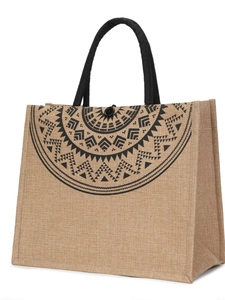 Eco-friendly jute tote bag with black mandala print and rope handles on white background