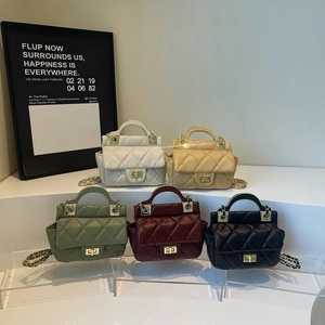 Quilted mini handbags with metal lock and round handles in five assorted elegant colors