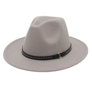 Detail of grey felt fedora featuring black leather band with metal rivets and ring