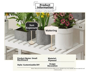 Detailed view of DIY wooden chalkboard plant labels with rectangular and cloud shapes