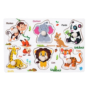 Detail of wooden animal puzzle board with easy-grip handles for preschool learning