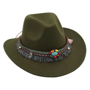 Detail of olive green wool felt hat with ethnic fringe, beads and turquoise stone