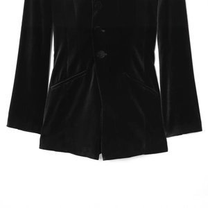 Front view of black velvet V-neck blazer jumpsuit with pocket detail and soft sheen
