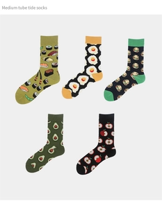 Detail view of five mid-tube socks featuring fun sushi, egg, burger, and fruit patterns