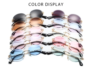 Various color options for rimless oval sunglasses with sleek metal temples and hinges
